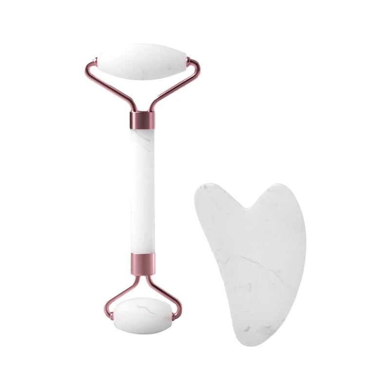 Facial massage roller with a Heart shaped Scraping plate