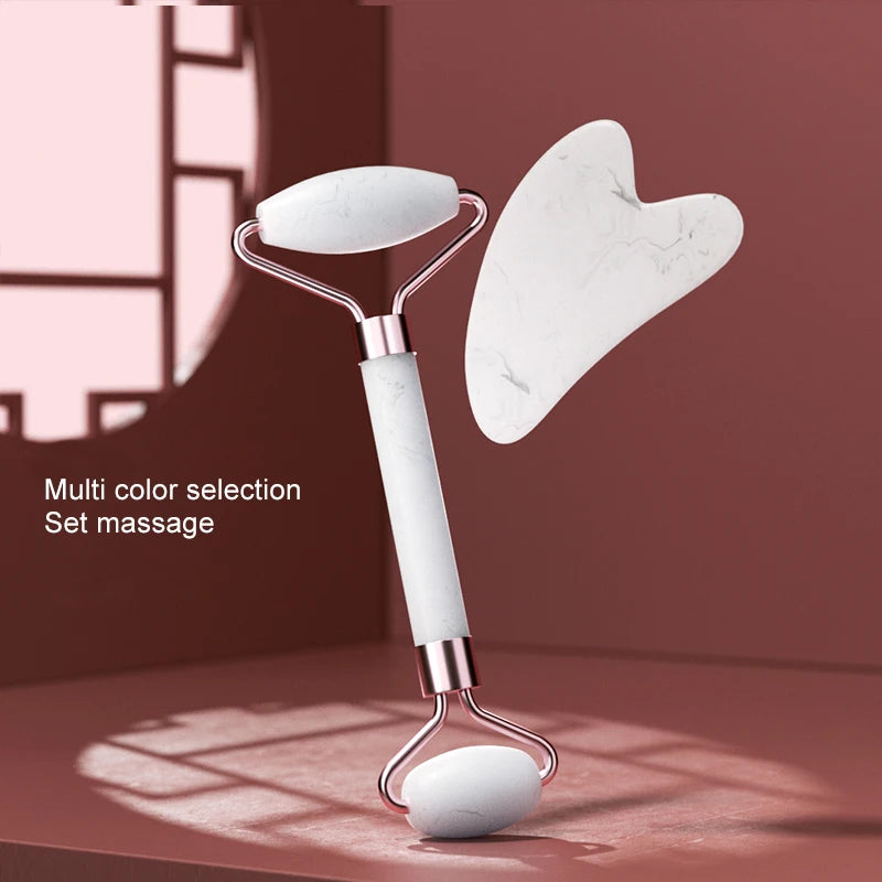 Facial massage roller with a Heart shaped Scraping plate