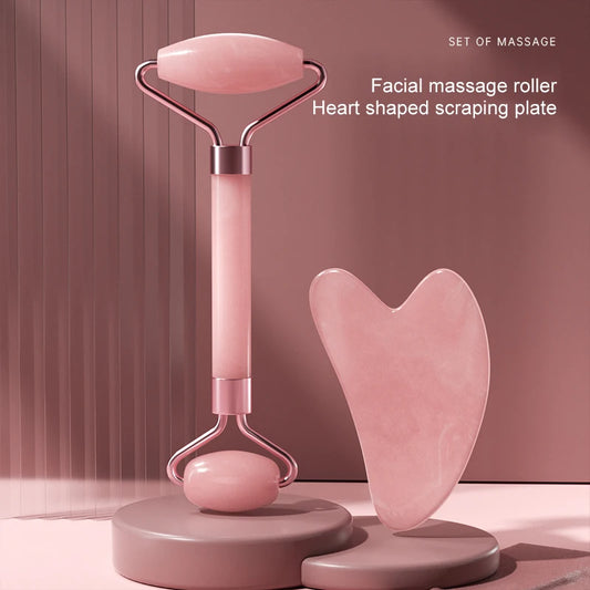 Facial massage roller with a Heart shaped Scraping plate