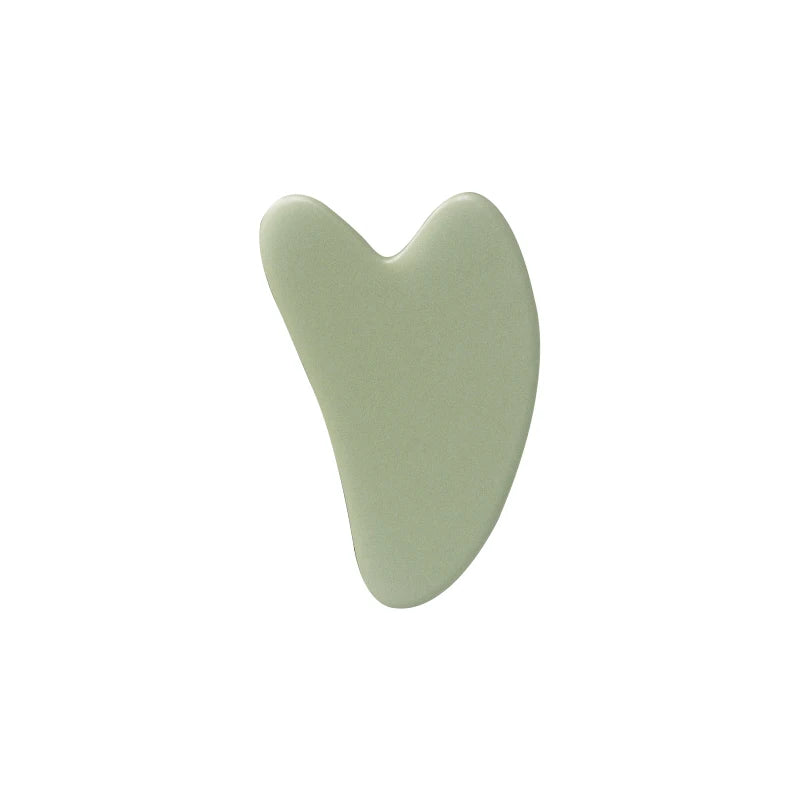 Facial massage roller with a Heart shaped Scraping plate